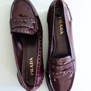 Prada loafers in maroon patent leather
